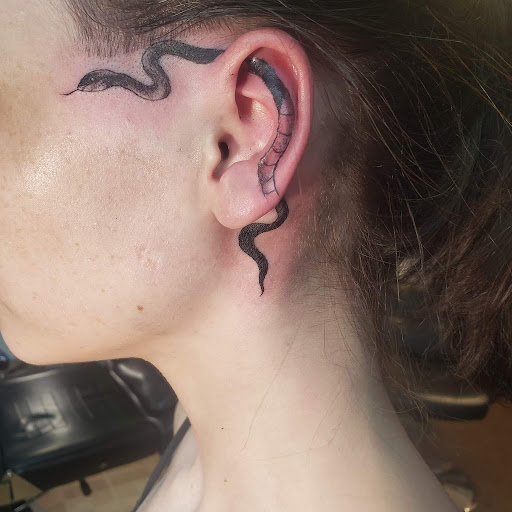Explore tattoo ideas flames, creative tattoo ideas in Decatur, available at Exclusive Ink Tattoos & Body Piercings 22nd & Wood