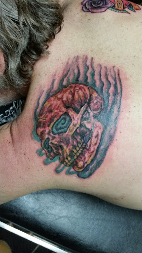 Explore female half sleeve tattoo ideas, creative tattoo ideas in Erie, available at EliKingInk