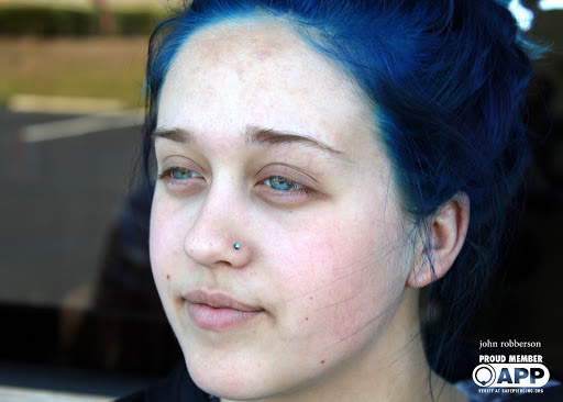 Explore red ink neck tattoo ideas, creative tattoo ideas in Fort Myers, available at Tiger Lotus Tattoo and Piercing