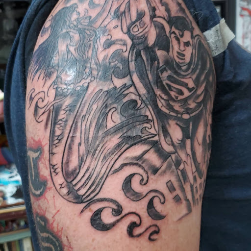 Explore saxophone tattoo ideas, creative tattoo ideas in Englewood, available at The Original Big Daddy Tattoo & Body Piercing est.1997 est.1997