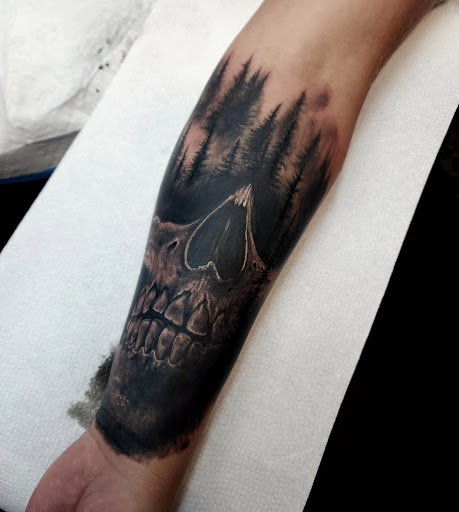 Explore crocodile tattoo ideas, creative tattoo ideas in Billings, available at Sovereign Tattoo