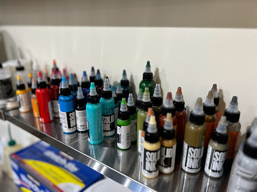 Explore rose tattoo cover up ideas, creative tattoo ideas in Seattle, available at Seattle Ink & Oil