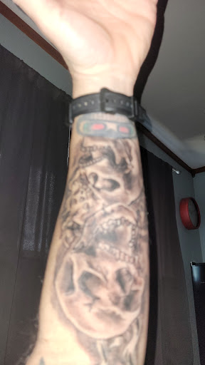 Explore tattoo ideas for fathers, creative tattoo ideas in Houston, available at Orlandos Tattoo Studio
