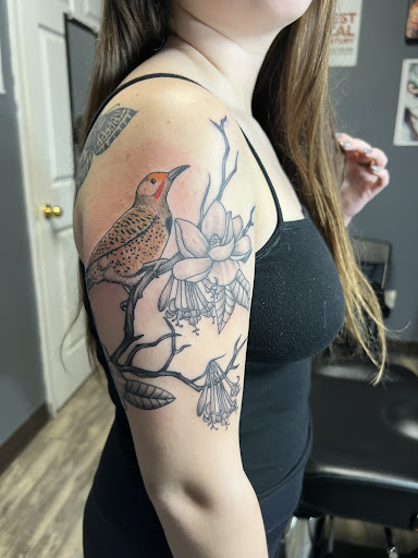 Explore back ear tattoo ideas, creative tattoo ideas in Athens, available at United Ink Tattoos and Body Piercings