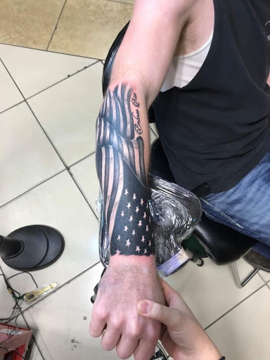 Explore neck tattoo ideas male, creative tattoo ideas in Cape Coral, available at The Tattoo Emporium