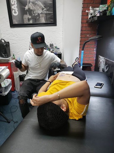 Tattoo Shop «Tuff City Tattoos», reviews and photos, 650 E Fordham Rd, Bronx, NY 10458, USA