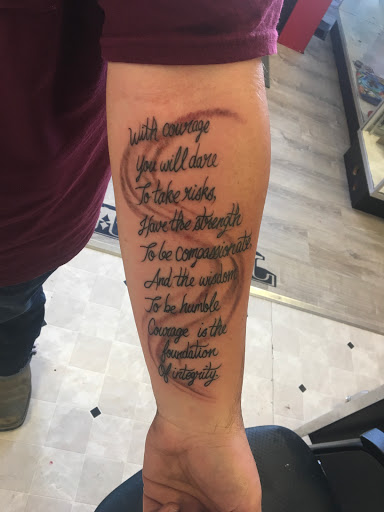 Explore dainty spine tattoo ideas, creative tattoo ideas in Stuart, available at Urban Inkers Tattoos