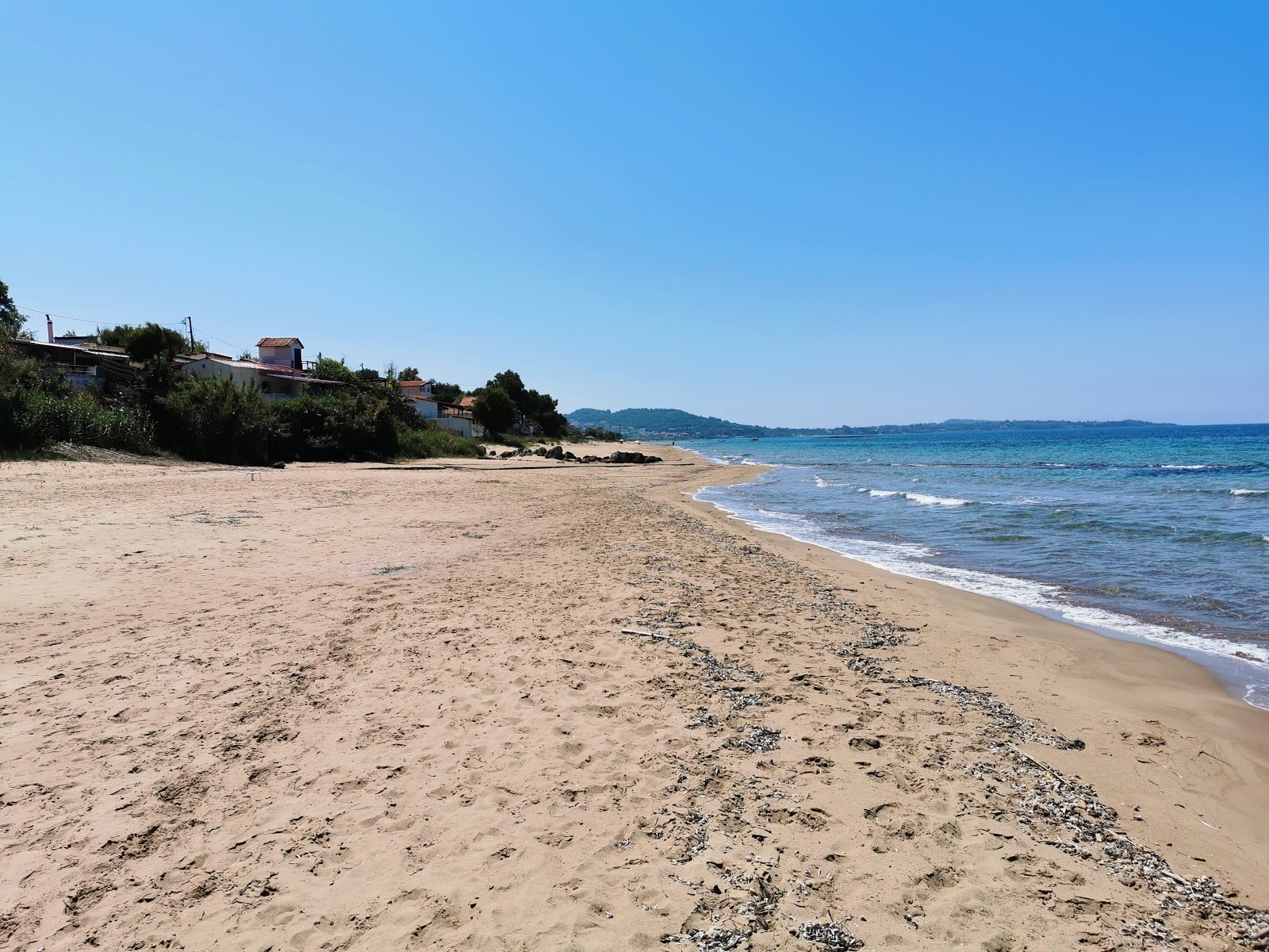 Photo de Agios Ilias beach avec sable fin et lumineux de surface