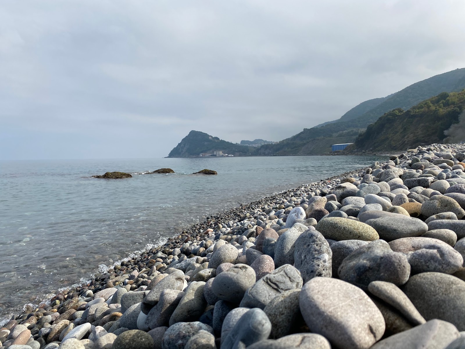Foto av Ciglik Plaj omgiven av klippor