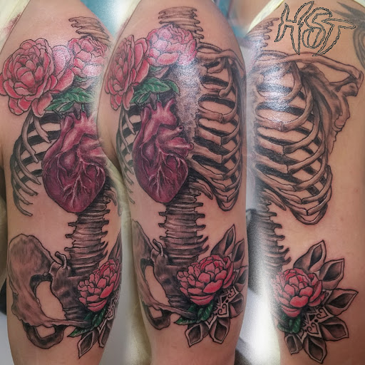 Explore shoulder scar tattoo ideas, creative tattoo ideas in Linn Creek, available at Hillard Skillard Tattoos, LLC.