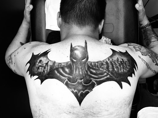 Explore head tattoo ideas for guys, creative tattoo ideas in Hamilton, available at Glass Ink Tattoo