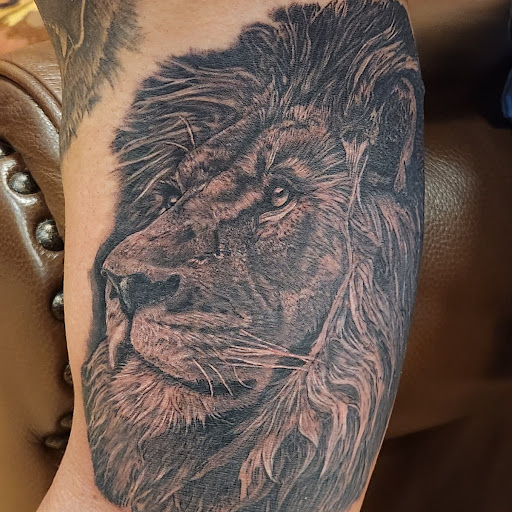 Explore december birth flower tattoo ideas, creative tattoo ideas in Mcminnville, available at Iron Tusk Tattoos