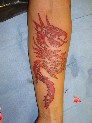 Explore baby feet tattoo ideas, creative tattoo ideas in Foley, available at Black Sheep Custom Tattoos and Piercings