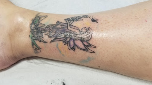 Tattoo Shop «Skin of A Different Color», reviews and photos, 2080 E New York St, Aurora, IL 60502, USA