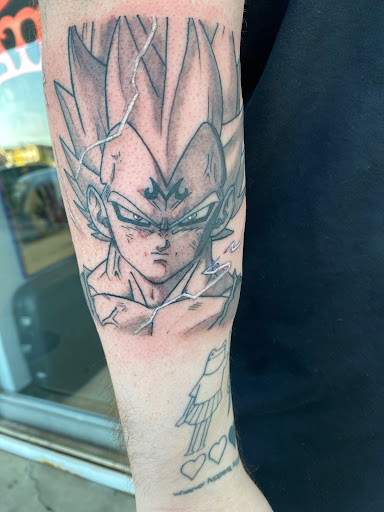 Explore rip cross tattoo ideas, creative tattoo ideas in Anaheim, available at Autumn Moon Tattoo