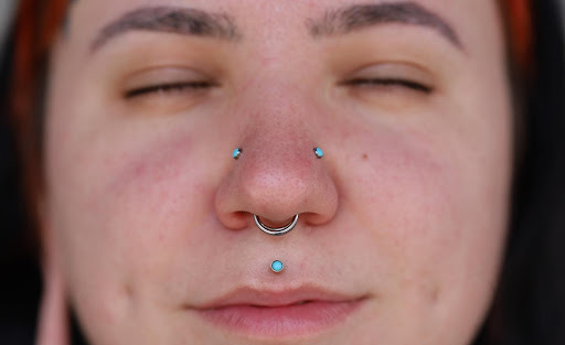 Explore tattoo cover up ideas for forearm, creative tattoo ideas in Portland, available at IRIS Piercing Studio and Jewelry Gallery