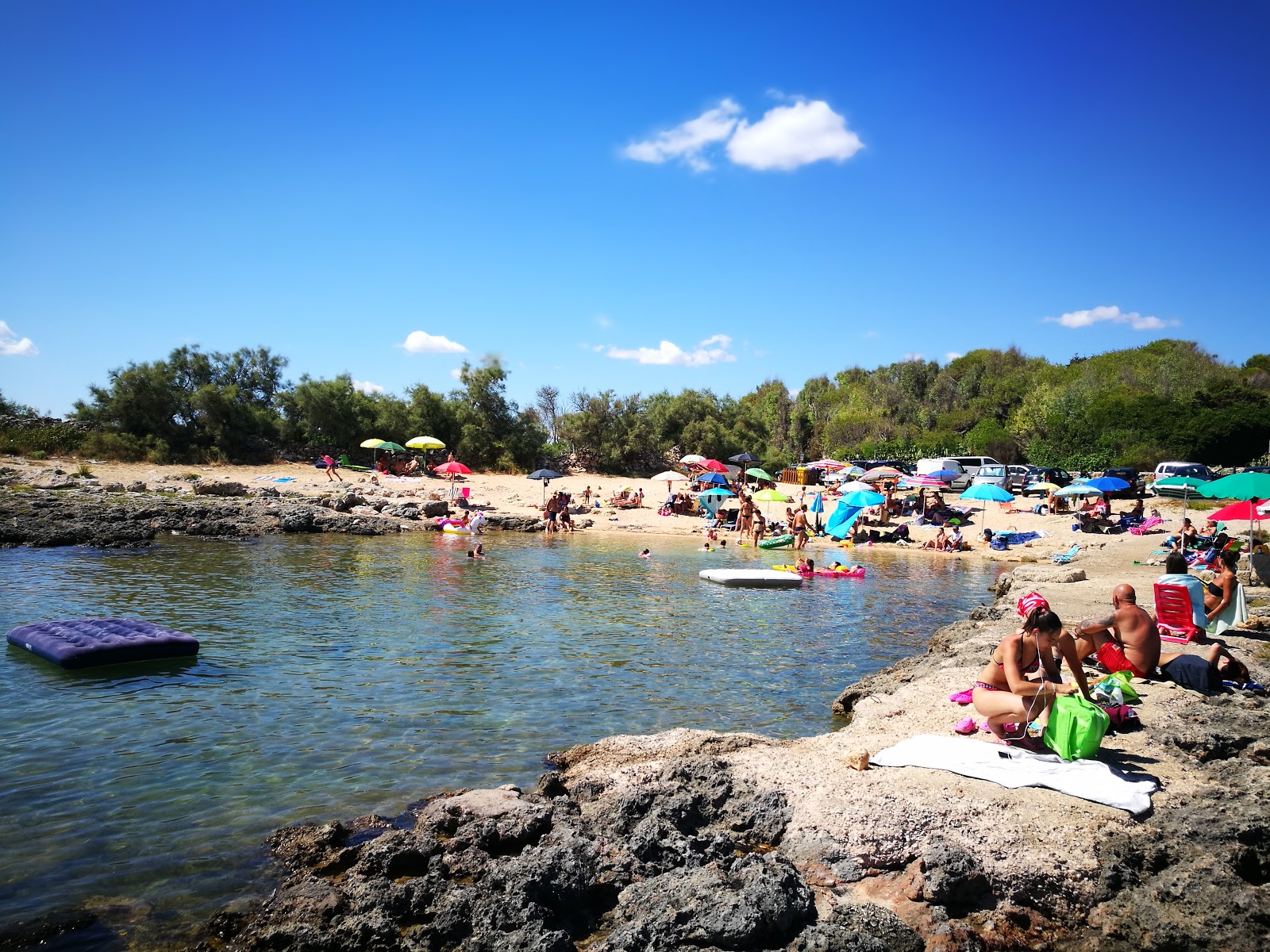 Foto di Spiaggia di Serra Cicora con una superficie del sabbia beige