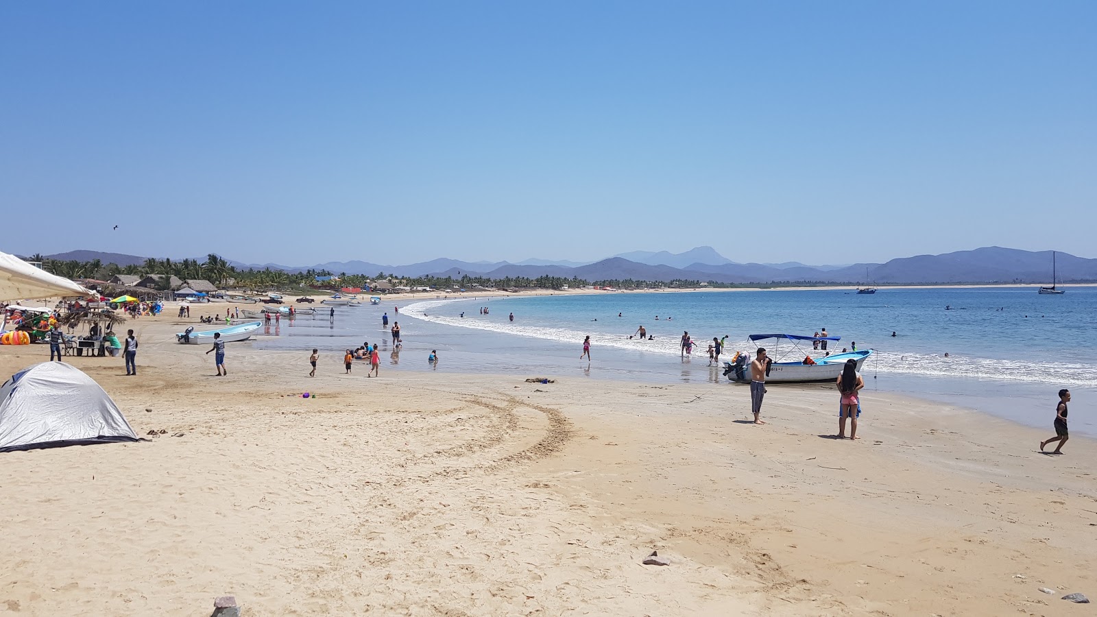 Fotografija Playa Punta Perula z svetel pesek površino