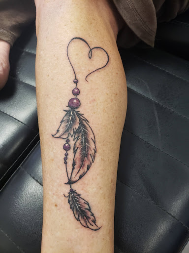 Explore honeysuckle tattoo ideas, creative tattoo ideas in Hudson, available at Inkredible Inc Tattoos