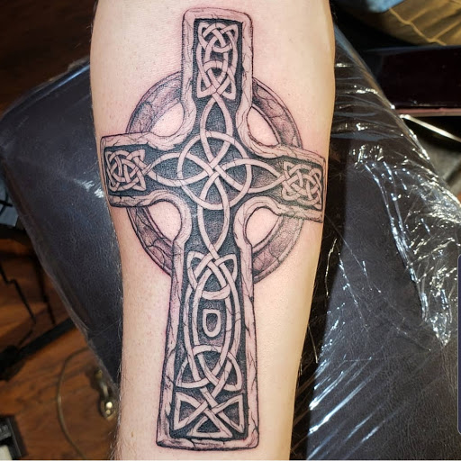 Explore bass tattoos ideas, creative tattoo ideas in Mooresville, available at Anythings Possible