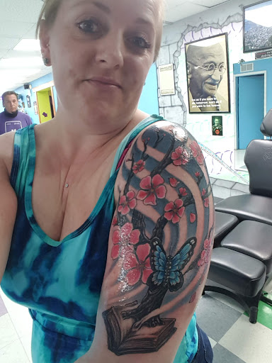 Tattoo Shop «Next Generation Tattoo & Body Piercing», reviews and photos, 1231 E Republic Rd, Springfield, MO 65804, USA