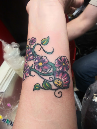 Explore new school tattoo ideas, creative tattoo ideas in Atlanta, available at Alien Touch Tattoo Inc