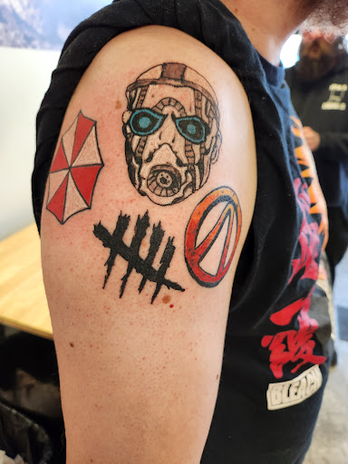 Explore cross tattoo ideas for men, creative tattoo ideas in Seymour, available at American Gypsy Tattoo Corp.