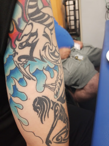 Explore husky tattoo ideas, creative tattoo ideas in Buffalo, available at Madd Ink Tattoo & Piercing