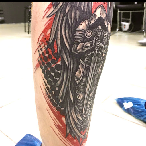 Explore red cardinal tattoo ideas, creative tattoo ideas in San Diego, available at SD Tattoo