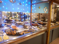 Atmosphère du Restaurant de fruits de mer La Poissonnerie du Cap à Cap d'Agde - n°9