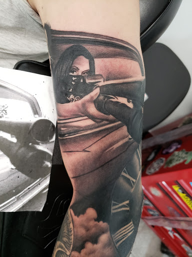 Explore black sleeve tattoo ideas, creative tattoo ideas in Warren, available at Dark Horse Tattoo Co. LLC.