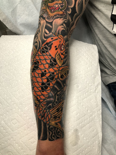 Explore michael name tattoo ideas, creative tattoo ideas in Oakwood, available at Victory Tattoo Co