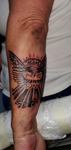 Find armband tattoo ideas for your next unique tattoo in Englewood at The Original Big Daddy Tattoo & Body Piercing est.1997 est.1997