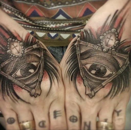 Explore men neck tattoo ideas, creative tattoo ideas in Powell, available at Tattoo Saga