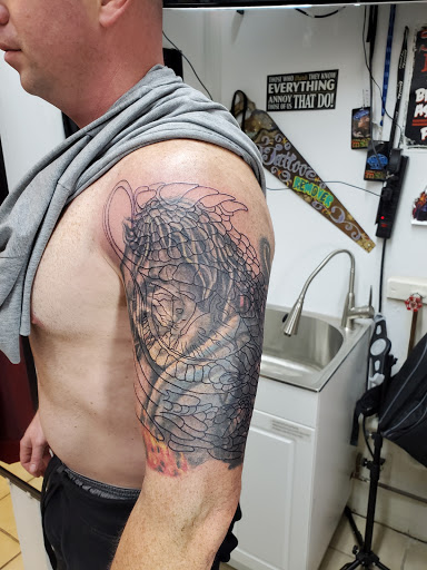 Explore maltese cross tattoo ideas, creative tattoo ideas in Radcliff, available at Baldys Tattoo & Piercing Parlor