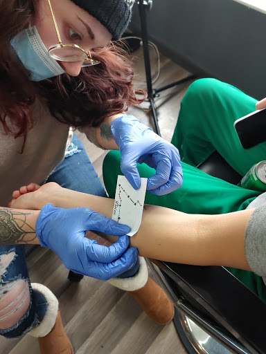 Explore book tattoo ideas small, creative tattoo ideas in Windsor, available at Spillen Ink