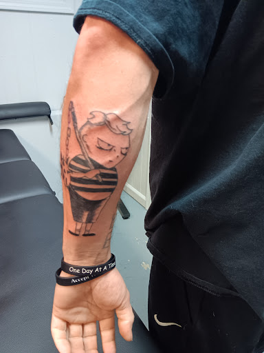 Explore neck tattoos ideas male, creative tattoo ideas in Muncie, available at The Tattoo Studio