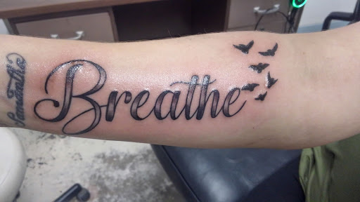 Explore fallen soldier tattoo ideas, creative tattoo ideas in Flint, available at Southern Outlaw Tattoo