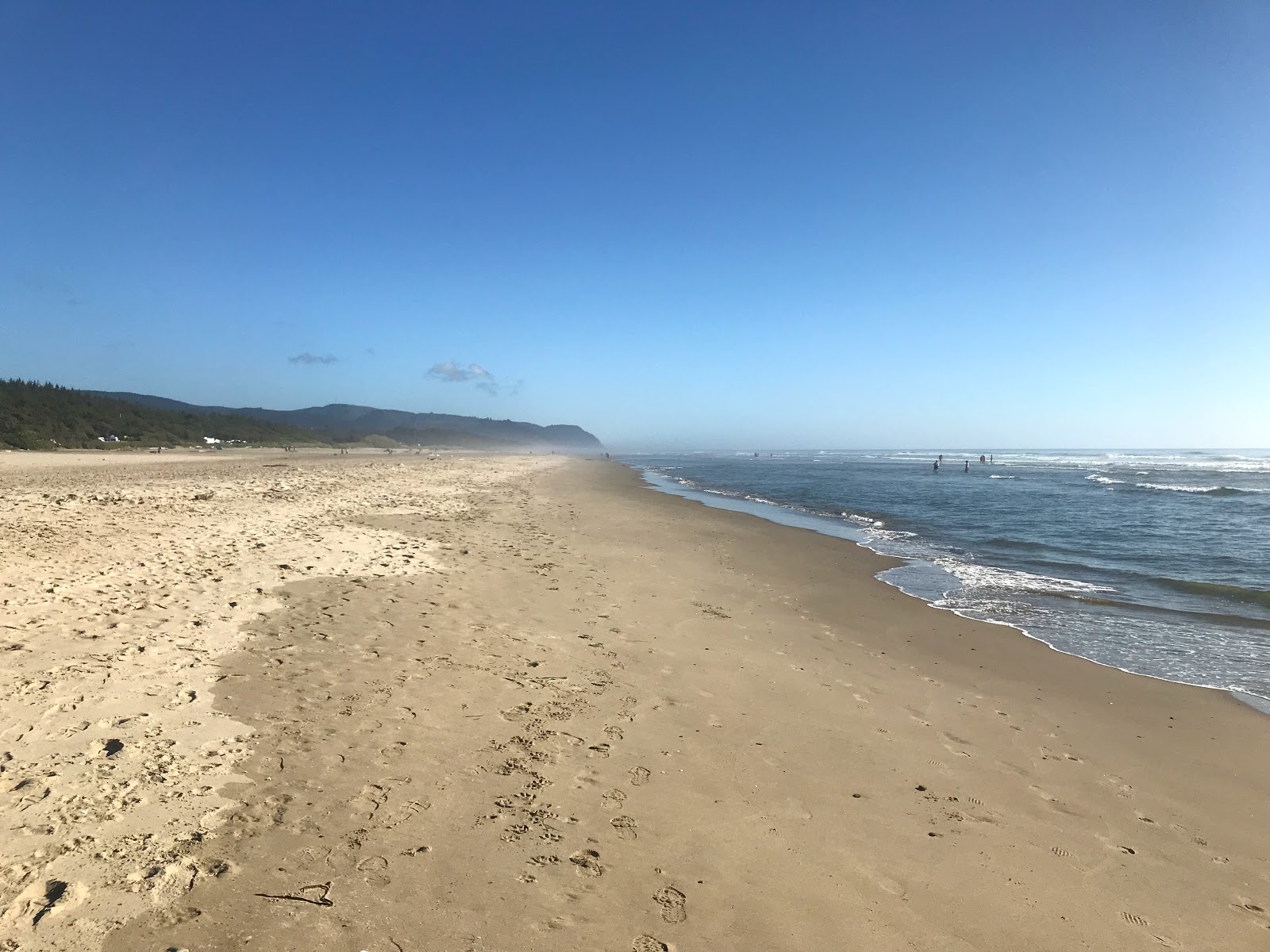Fotografija Wakonda Beach z svetel pesek površino