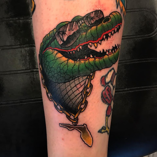 Explore patriotic forearm tattoo ideas, creative tattoo ideas in Lakeland, available at Black Swan Tattoo