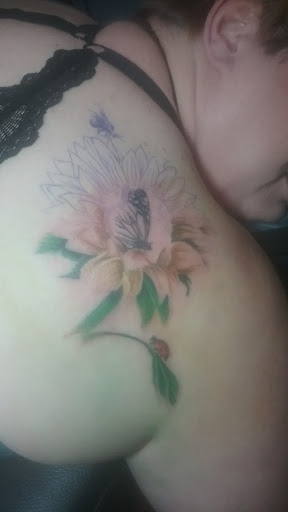 Explore godparent tattoo ideas, creative tattoo ideas in Rock Island, available at OTool Design Custom Tattoo