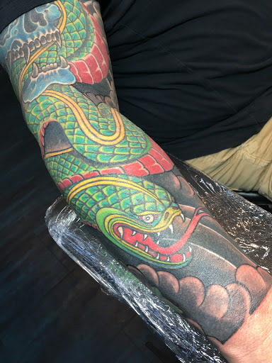 Explore family flower tattoo ideas, creative tattoo ideas in Kansas City, available at Stormy Tattoo