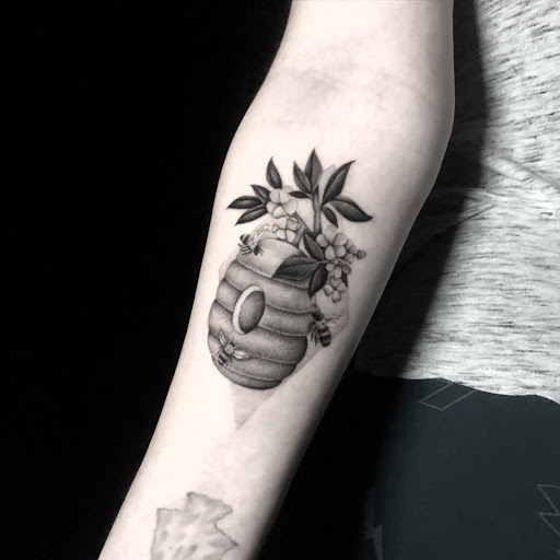 Explore money bag tattoo ideas, creative tattoo ideas in Englewood, available at Title Tattoo Studios