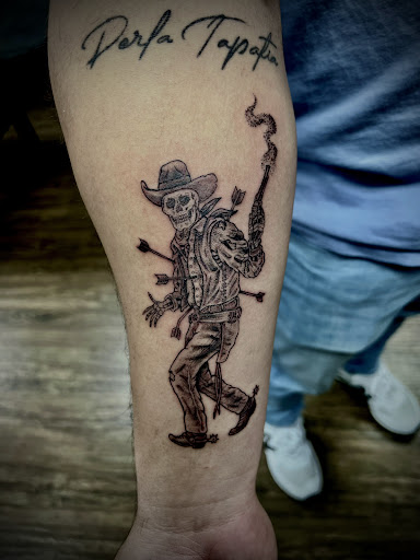 Explore red cardinal tattoo ideas, creative tattoo ideas in Dallas, available at Legacy Arts Tattoo 2