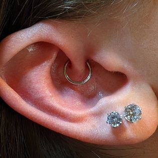 Explore minimalist cat tattoo ideas, creative tattoo ideas in Minocqua, available at Lotus Piercing