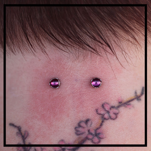 Explore tattoo ideas for survivors, creative tattoo ideas in Brainerd, available at Red at Night Tattoos and Piercings