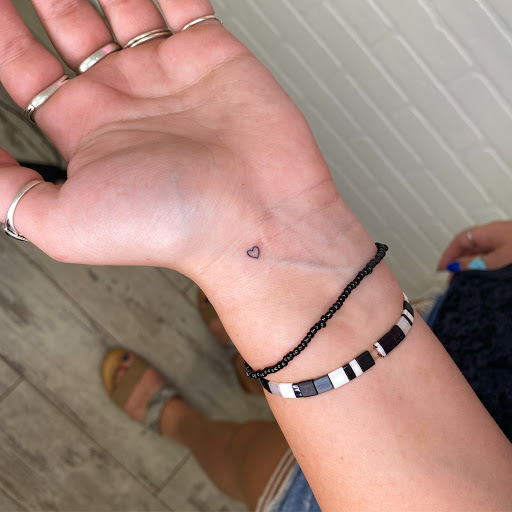 Explore hand tattoo cover up ideas, creative tattoo ideas in San Francisco, available at Echo Esthetics