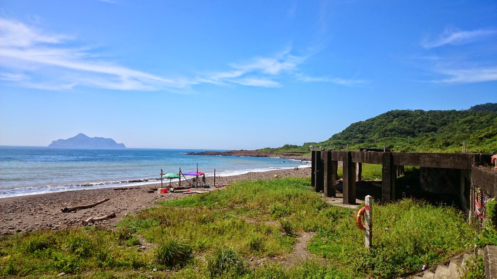 Foto di Daxi Honeymoon Bay Beach e l'insediamento