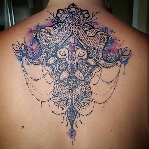 Explore catholic tattoo ideas for guys, creative tattoo ideas in Pendleton, available at Just Another Hole in the Wall Tattoo