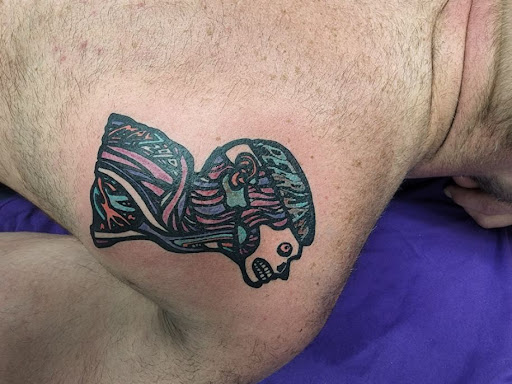 Explore infertility tattoo ideas, creative tattoo ideas in Foley, available at Symbolic Ink Tattoo Studio